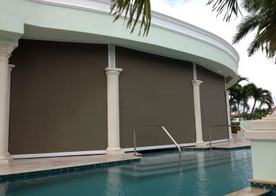 Hurricane screens installed on the bank of pool
